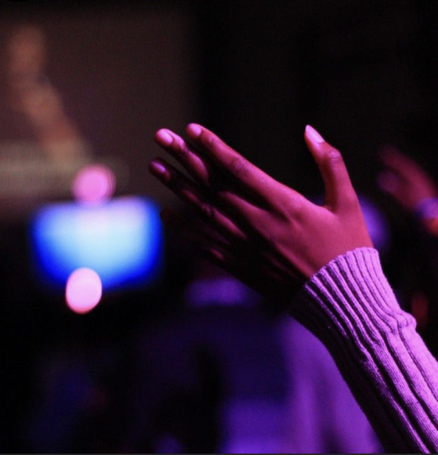 Hands raised in worship